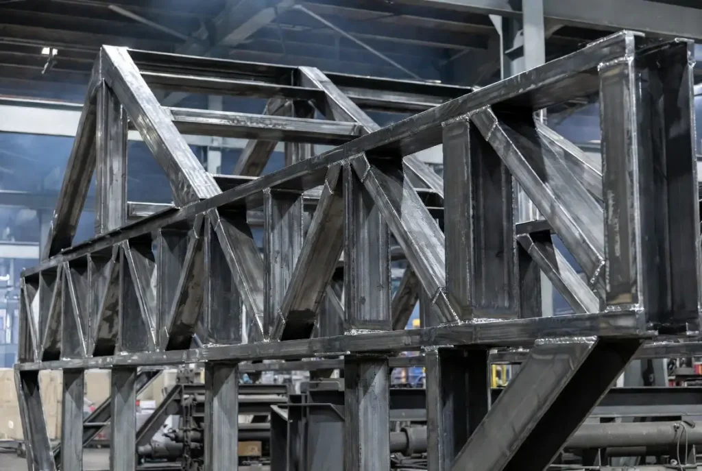 CNC machined 1045 carbon steel structural frame for heavy machinery