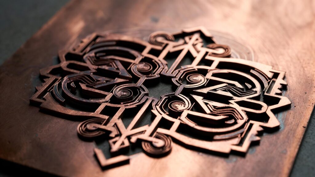 copper or brass laser-cut intricate designs