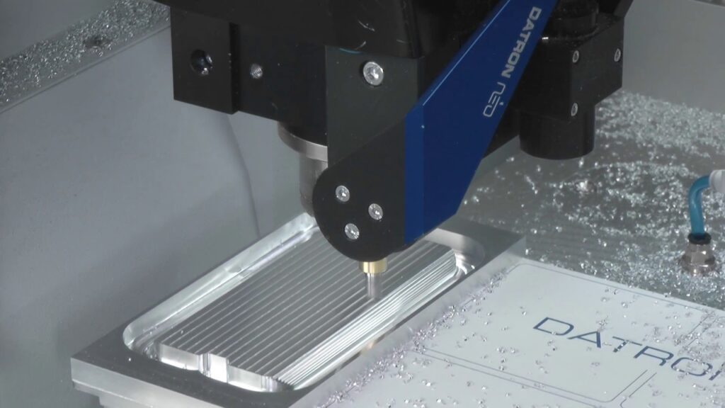 Real-time CNC milling of an aluminum prototype — the heart of the process.